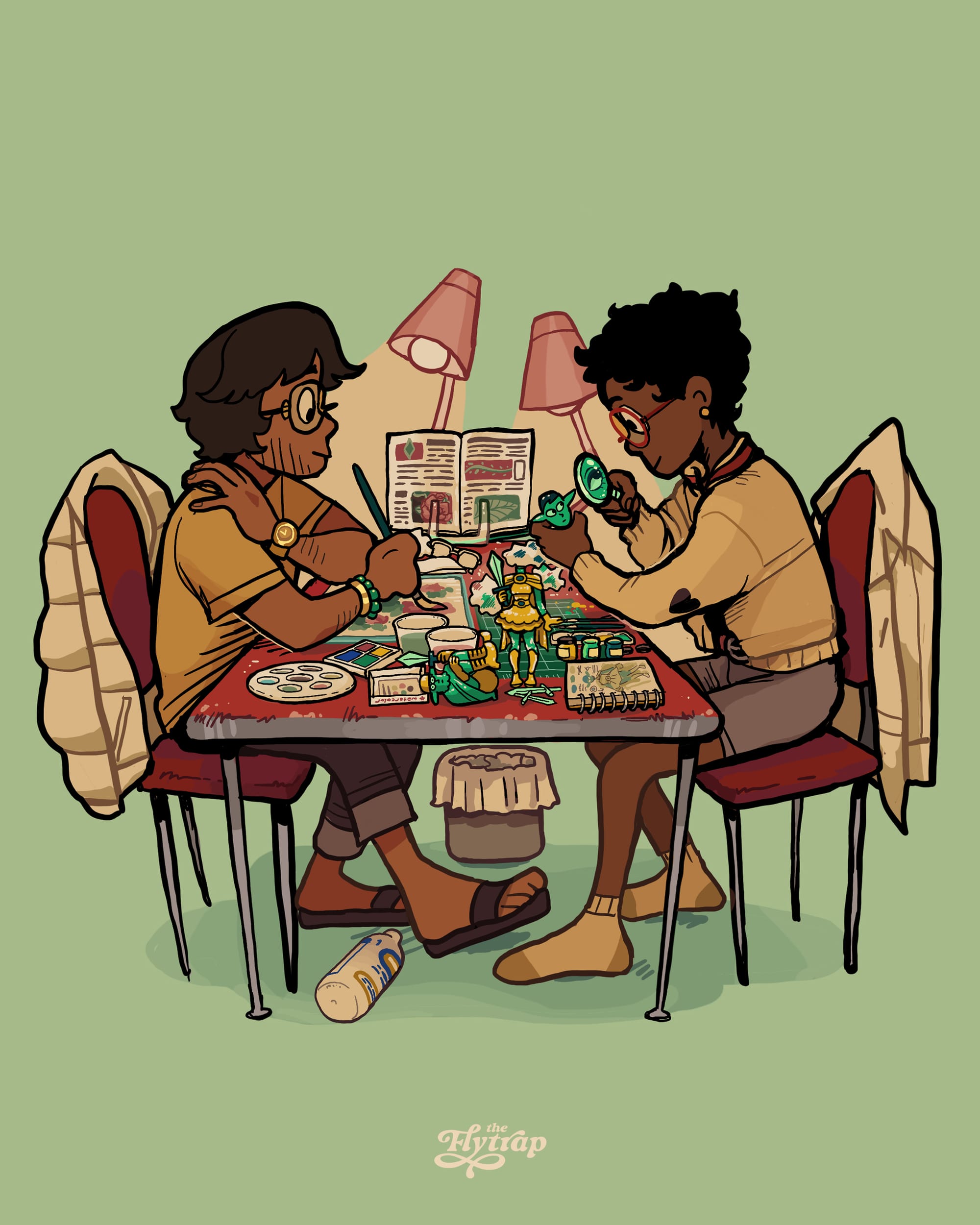 A Southeast Asian person and a Black person, both visually impaired, sit at a table cluttered with art supplies as they paint figurines.